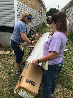 ovb employees working on habitat for humanity project