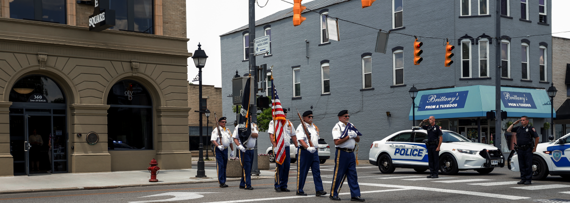 VFW honor guard carrying American flag