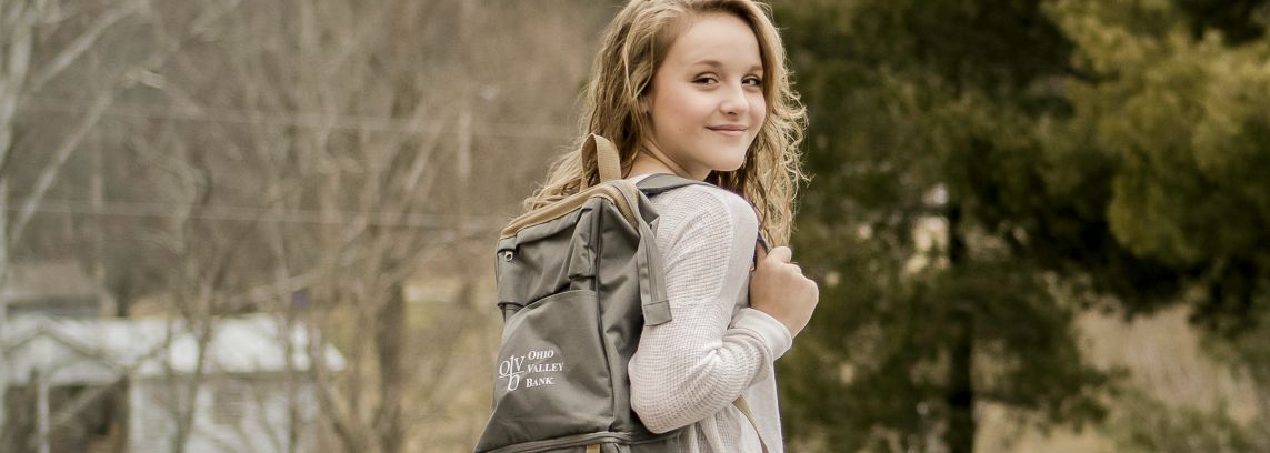 young girl with backpack