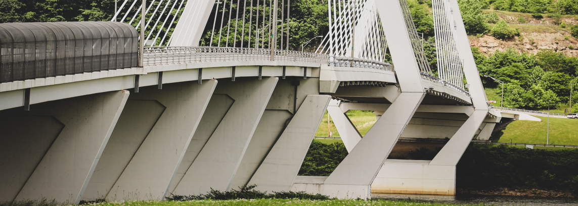 photo of bridge as seen from riverbank