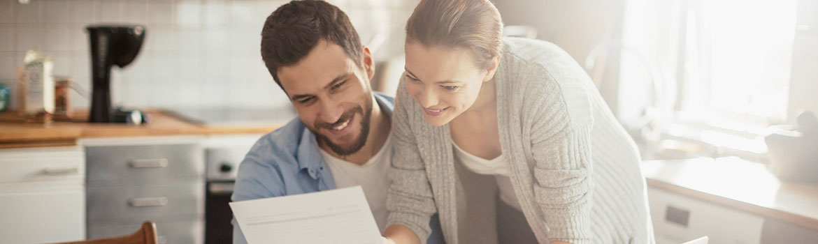 Couple looking at documents